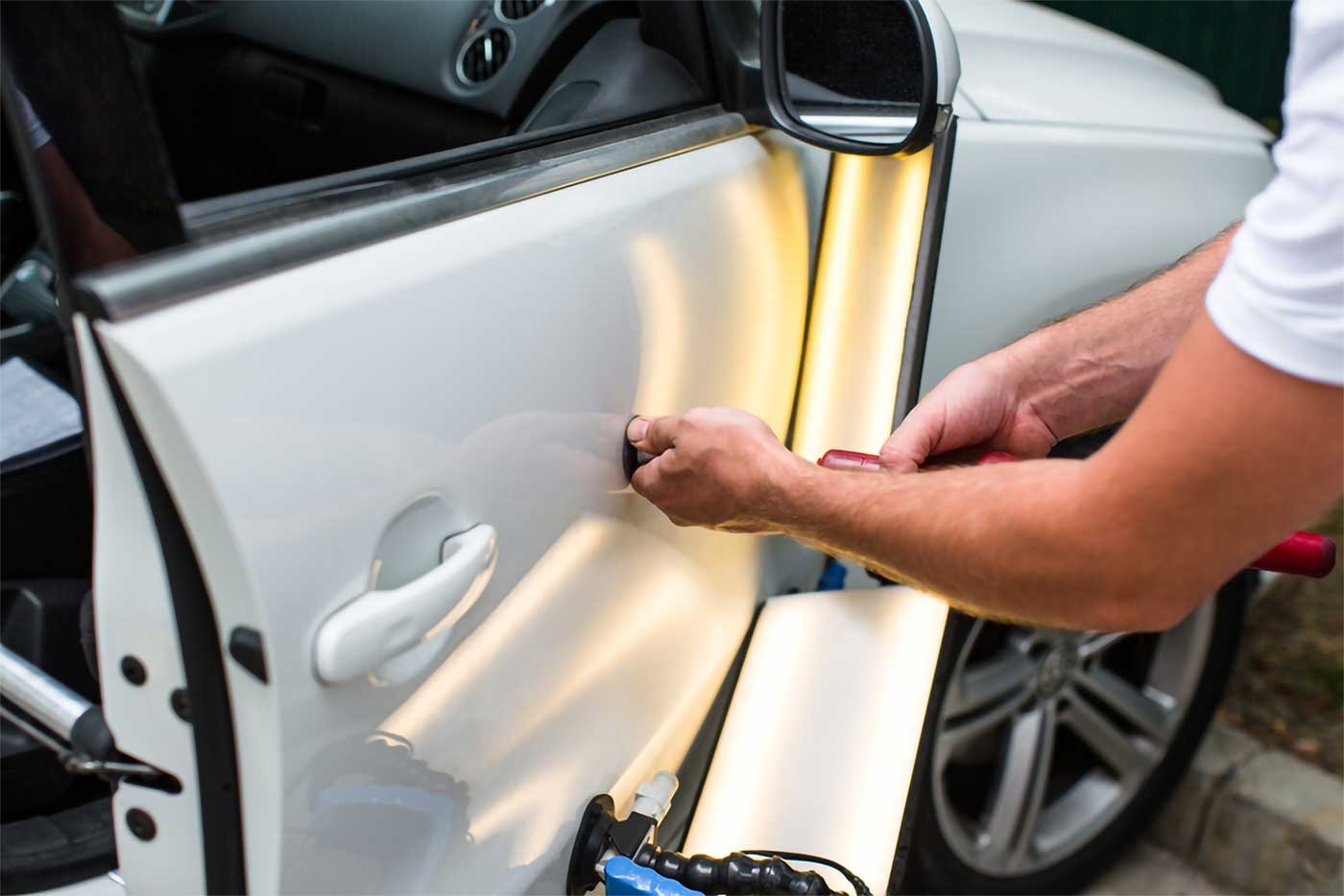 Paintless dent repair — DG Collision Experts, Lewisville TX
